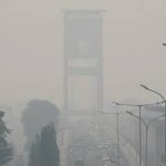 Jembatan Ampera Palembang Saat Tertutup Kabut Asap yang Cukup Tebal. Foto : Ist